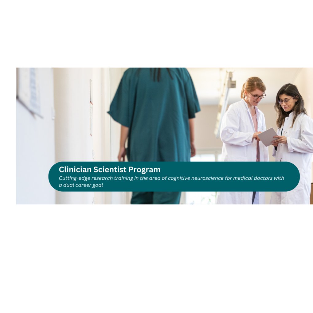 Two female scientist in white lab coat look at a document.